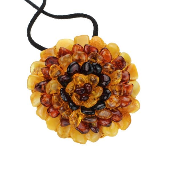 "Gintarinė gėlė" segė - pakabukas.