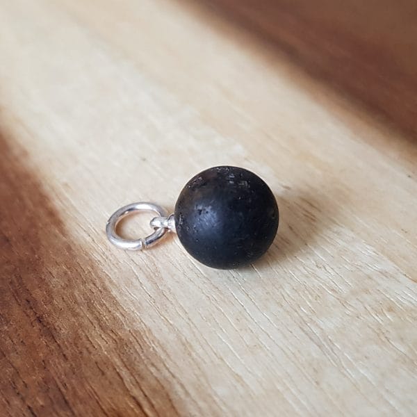 Gintarinis pakabukas "Paslapties akis"