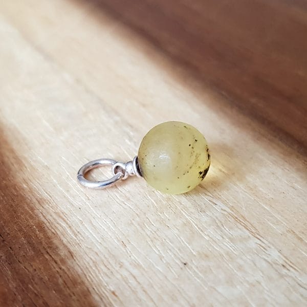 Gintarinis pakabukas "Paslapties akis"