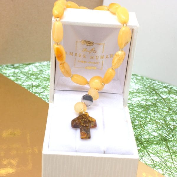 Geltono gintaro pakabukas mašinai "Aplink pasaulį"